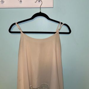 White sleeveless top